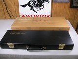 7956
Winchester Shotgun case with red interior, Has a key and Original Box! Will take Barrels up to 27”.
