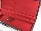 7956
Winchester Shotgun case with red interior, Has a key and Original Box! Will take Barrels up to 27”. - 7 of 9