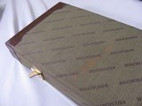 7960
Winchester Green Shotgun Case, very nice condition, with spacer blocks, 29 Inch barrels. - 3 of 6