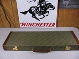 7962
Winchester Green Shotgun hard Trunk case, Will fit a 28” barrel, New old Stock, Has red interior, comes with the keys - 1 of 12
