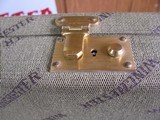 7962
Winchester Green Shotgun hard Trunk case, Will fit a 28” barrel, New old Stock, Has red interior, comes with the keys - 5 of 12