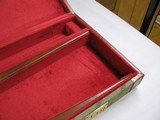 7962
Winchester Green Shotgun hard Trunk case, Will fit a 28” barrel, New old Stock, Has red interior, comes with the keys - 10 of 12