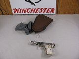 7951  Colt 1903 Pocket Hammerless Pocket Pistol, MFG 1904, 32 ACP, Custom Nickle Re-Finish, Pearlite Grips, with sock and soft case. - 1 of 9