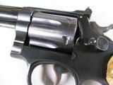 7963
Smith and Wesson K-22
22LR, Adjustable Rear Sight, Fake Stag Grips, Comes with the original Wood Smith and Wesson Grips, 4 inch barrel - 7 of 11
