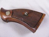 7963
Smith and Wesson K-22
22LR, Adjustable Rear Sight, Fake Stag Grips, Comes with the original Wood Smith and Wesson Grips, 4 inch barrel - 10 of 11