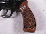 7967
Smith and Wesson
32, 32 long, original wood grips, 4” Barrel,
round front sight, 98% - 2 of 10