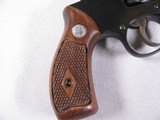 7967
Smith and Wesson
32, 32 long, original wood grips, 4” Barrel,
round front sight, 98% - 6 of 10