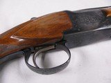 7981
Winchester 101 20 GA, 28 Inch, M/F, Winchester butt plate, First three years of production, Has the Brass Front bead, Pistol Grip with Red “W”, - 13 of 14