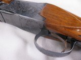 7982
Winchester 101 12 GA, 28 Inch, Mod/Full, Nice Dark Wood, Pistol Grip with cap, Vent rib, Ejectors, Single Brass Bead, 98%, Closes and opens tigh - 5 of 15
