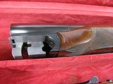 7986
Winchester 23 Classic 28 Gauge, 26 inch Barrels, IC/Mod, Vent Rib, Single selective Trigger, Ejectors, Tiger Striped AA++ Fancy Walnut, Gold Rai - 11 of 18