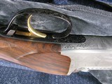 7987PerazziMX8-20 SC3 Grade, 20 Gage, have only been fired once. Matched oil SC3 Grade with Pistol Grip stock, very Figured. It has Improved and M - 5 of 14
