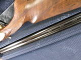 7987PerazziMX8-20 SC3 Grade, 20 Gage, have only been fired once. Matched oil SC3 Grade with Pistol Grip stock, very Figured. It has Improved and M - 12 of 14