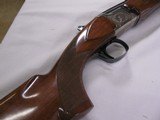 7990
Winchester 101 XTR Lightweight, 20 Gauge, Screw In Chokes IC/MOD, Vent Rib, Coin Receiver, Winchester Butt Pad, Opens and Closes tight, Bores Br - 10 of 11
