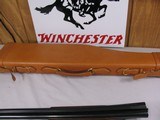 7994
Winchester 21, 12 Ga, Vent Rib, Mid Metal Bead, Bradley Front Bead, Engine Turned Water Table, Stright Grip, 26 Inch Barrels, 14 inch LOP, Close - 14 of 15
