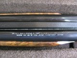 7997
SKB 385 Ducks Unlimited set, Only 200 were Made, 20/28 Ga, The stock is C-grade American walnut in high gloss finish with a semi-beavertail fore - 14 of 20