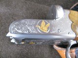 7997
SKB 385 Ducks Unlimited set, Only 200 were Made, 20/28 Ga, The stock is C-grade American walnut in high gloss finish with a semi-beavertail fore - 6 of 20