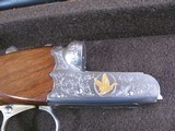 7997
SKB 385 Ducks Unlimited set, Only 200 were Made, 20/28 Ga, The stock is C-grade American walnut in high gloss finish with a semi-beavertail fore - 8 of 20