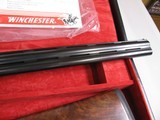 8001
Winchester 101 The Grouse Gun, 20 Ga, 2 3/4 and 3 inch, 26 inch barrels, 14 1/4 LOP, IC/M, Gold trigger, Round Knob, Winchester Pad, Silver rece - 12 of 18