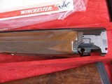 8001
Winchester 101 The Grouse Gun, 20 Ga, 2 3/4 and 3 inch, 26 inch barrels, 14 1/4 LOP, IC/M, Gold trigger, Round Knob, Winchester Pad, Silver rece - 13 of 18