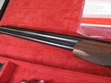 8001
Winchester 101 The Grouse Gun, 20 Ga, 2 3/4 and 3 inch, 26 inch barrels, 14 1/4 LOP, IC/M, Gold trigger, Round Knob, Winchester Pad, Silver rece - 14 of 18