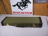 8012Winchester Quail Special green case with green interior, NOS, beautiful condition. With 410 ga paperwork NOS. Comes with the original keys. - 1 of 8