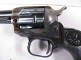 8015
Colt Peacemaker 22LR, 6” Barrel, MFG 1971
99% Blue, Includes Factory box and papers. Appears unfired, black eagle grips. - 4 of 12