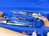 8013
Colt 1860 Army U.S. Calvary Commemorative two gun set, 44 Cal, Black Powder, 8” Barrel unfired, Includes Factory wooden English Fitted Display c - 3 of 16