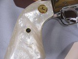 8016
Colt Frontier Scout 22LR, MFG 1967, 4.75 Barrel, Includes original Colt Red Velvet case and papers. Faux Pearl grips includes original colt waln - 6 of 14