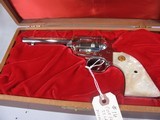 8016
Colt Frontier Scout 22LR, MFG 1967, 4.75 Barrel, Includes original Colt Red Velvet case and papers. Faux Pearl grips includes original colt waln - 2 of 14