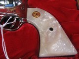 8016
Colt Frontier Scout 22LR, MFG 1967, 4.75 Barrel, Includes original Colt Red Velvet case and papers. Faux Pearl grips includes original colt waln - 3 of 14