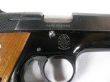 8018Smith and Wesson 39-2 9MM Auto, 8 Shot Magazine, 4 “ Barrel, Checkered walnut grips, MFG 1971, Includes Box not numbered to the gun, It also has - 4 of 12