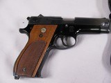8018Smith and Wesson 39-2 9MM Auto, 8 Shot Magazine, 4 “ Barrel, Checkered walnut grips, MFG 1971, Includes Box not numbered to the gun, It also has - 2 of 12