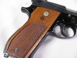 8018Smith and Wesson 39-2 9MM Auto, 8 Shot Magazine, 4 “ Barrel, Checkered walnut grips, MFG 1971, Includes Box not numbered to the gun, It also has - 3 of 12