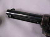 8023 Colt Peacemaker 22LR./WMR, 4.4” barrel, MFG 1974 with dual cylinders. Black eagle grips excellent condition - 5 of 11