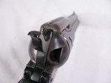 8023 Colt Peacemaker 22LR./WMR, 4.4” barrel, MFG 1974 with dual cylinders. Black eagle grips excellent condition - 9 of 11