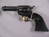 8023 Colt Peacemaker 22LR./WMR, 4.4” barrel, MFG 1974 with dual cylinders. Black eagle grips excellent condition - 2 of 11