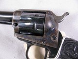 8023 Colt Peacemaker 22LR./WMR, 4.4” barrel, MFG 1974 with dual cylinders. Black eagle grips excellent condition - 4 of 11