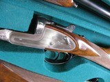 8030
Arrieta Crown Grade 2 gun matched set , Gun #1 20 GA IC/MOD 25” Barrels, Gun #2 20 GA IC/IM 25” Barrels, Consecutive S/Ns 30566/30565. Splinter - 11 of 22