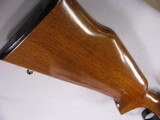 8029Remington 788 44 Rem Mag, 22 Inch Barrel, Redfield 3X9 Royal Scope, 99%condition, Rare Caliber, Nice wood stock, 2 magazines. - 11 of 14