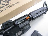 8038Smith and Wesson M+P 15 Sport II, 5.56/223 REM, 16” Barrel, NIB with added MagPul Collapsible stock, Original Stock is included as well, It also - 10 of 15