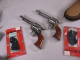 8042
Ruger New Vaquero 2 gun set consecutive serial numbers, 357 mag, 5 1/2 barrel, polished stainless finish, Hogue New Vaquero smooth grips, includ - 2 of 14