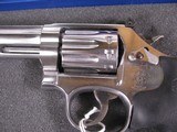 8043Smith and Wesson Model 617 22 LR, Round K Frame, Stainless steel, original Hougue rubber grips, 10 shot fluted cylinder, includes factory case a - 3 of 11