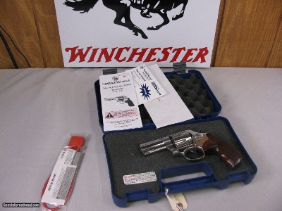 8045
Smith and Wesson Model 686 plus Deluxe 357 Magnum, stainless steel, 7 shot cylinder, 3” full underplug barrel, red ramp front sight, white outli