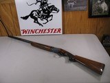 8046
Winchester 101 field 410 gauge 26 inch barrels 2 3/4 and 3” chambers, IC/MOD, pistol grip with cap, ejectors, brass front bead, Winchester Butt