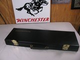 8062Winchester Black Shotgun case with red interior, Will take up to 27.5 “ barrels. It has the original keys. Beautiful condition inside and out. C