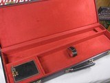 8062
Winchester Black Shotgun case with red interior, Will take up to 27.5 “ barrels. It has the original keys. Beautiful condition inside and out. C - 4 of 6