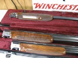8071Winchester 101 Pigeon Skeet set in 20 Ga, 28 GA and 410 GA. All Barrels are choked SK/SK and are 28” Barrels. Pistol grip with a Winchester pad - 13 of 21