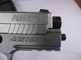 8076Sig Sauer P220 Elite Stainless Steel, 45 Cal, P220R3 45 SSE. Comes in its box with paperwork, like new, 2 magazines, wood grips, Amazing accurat - 4 of 13