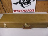 8079
Winchester Tan/Yellow Shotgun case trunk style. Yellow interior. Great condition will fit up to a 32” Barrel. - 1 of 10