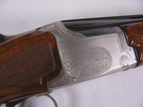 8080
Winchester 101 Pigeon 12 GA, 26” Barrels, IC/MOD, Round Knob, Winchester but plate, Hard to find in this configuration, Rose and scroll engraved - 14 of 16